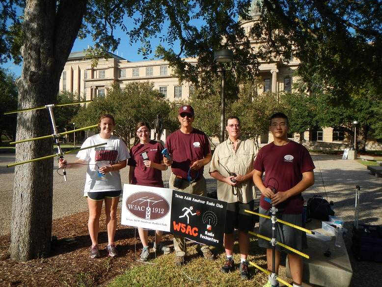 W5AC Foxhunters - Left-to-Right: Becca with 2m Yagi and receiver; April with 80m receiver; Dave W5QZ with 80m receiver; Marty W5MHN with 2m HT; Yucheng KG5GDV with 2m Yagi and receiver.